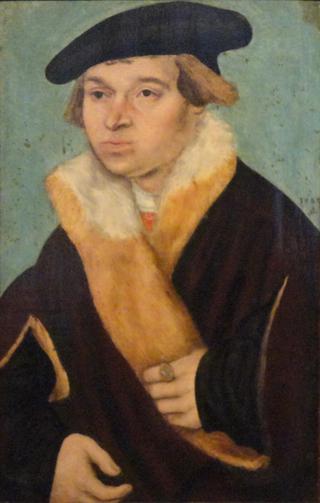 Portrait of a Clean-shaven Young Man in a Cloak trimmed with Light Fur
