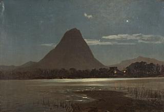 apan, inland lake with illuminated temple on the shore and volcanic mountain