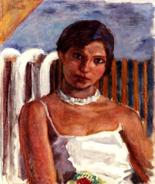 Brunette with White Necklace in front of a Radiator