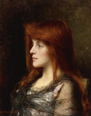 An auburn haired young woman