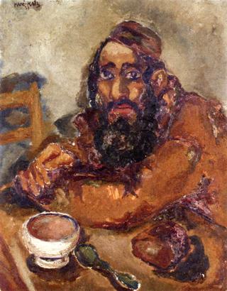 Seated Man at a Table