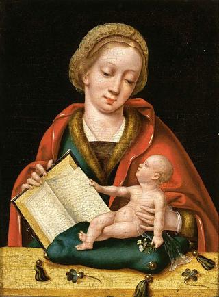 The Madonna and Child holding a book