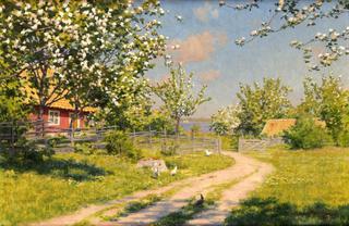 Cottage with flowering fruit trees