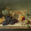 水果、坚果和大理石壁架上的玻璃杯的静物画